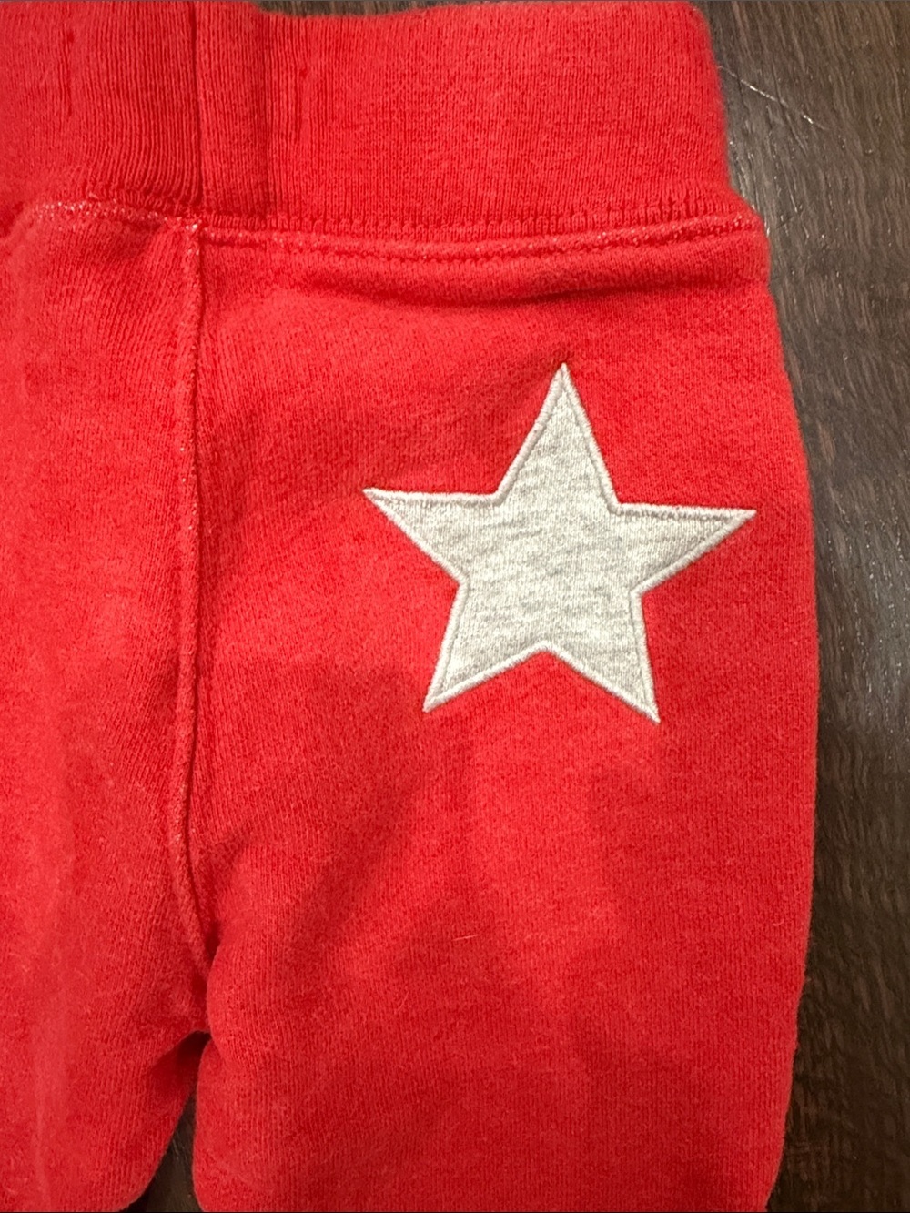 Baby Boden Red Jogger Pants with Blue Striped Cuffs and Star Detail on Backside - Picture 5 of 7